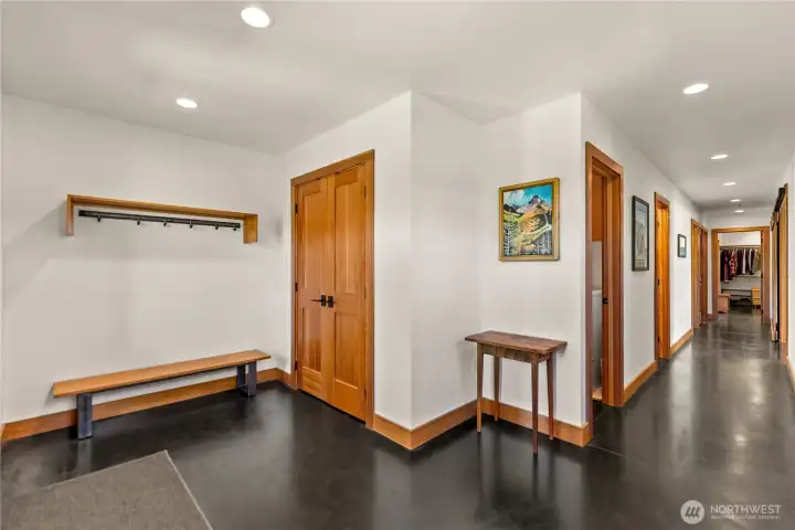 Radiant electric mats under concrete heat all floors in 8 separate zones.