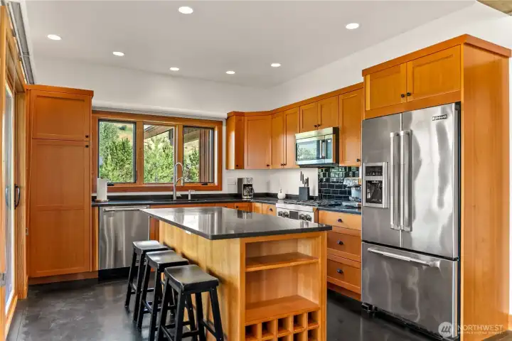 Jenn-Air Stainless Steel kitchen suite and propane cooktop.