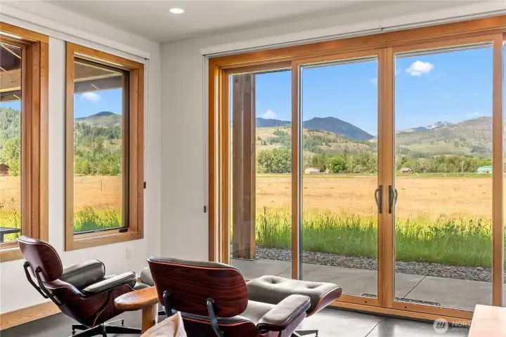 Enjoy comfort and flexibility year-round with remote-operated exterior Rainier shade blinds and multiple covered decks to follow the sun or shade.
