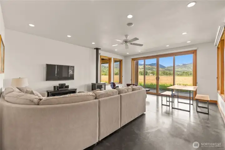 Living room ceiling has embedded speakers for optional TV surround sound experience.