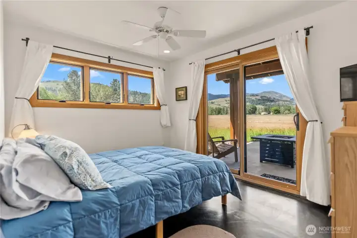 Walk out your bedroom door to your covered deck with a view.