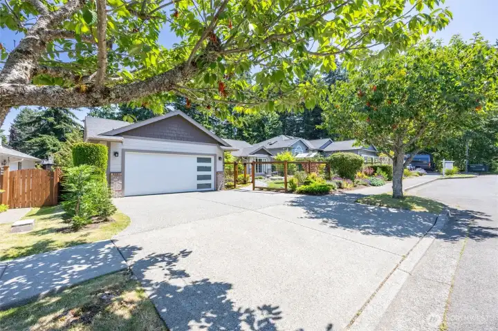 New updated garage door, fenced front yard and picturesque tree lined Woodside Way. New updated garage door, fenced front yard and picturesque tree lined Woodside Way.