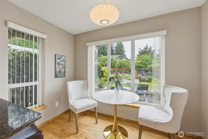 Sip your morning coffee at this breakfast nook looking out to the beautiful front yard and garden space. Sip your morning coffee at this breakfast nook looking out to the beautiful front yard and garden space.