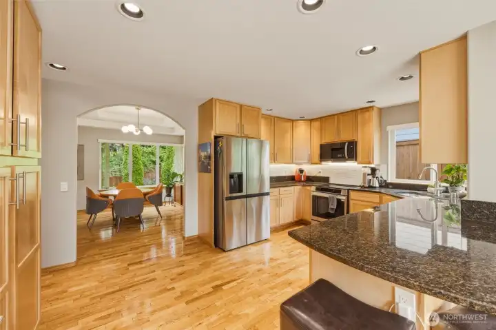Great look at the nice kitchen with plenty of storage space, granite countertops and new SS appliances Great look at the nice kitchen with plenty of storage space, granite countertops and new SS appliances