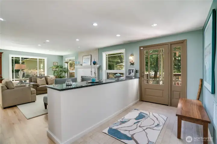 A light-filled entry opens to refinished hardwoods and an easy, connected main level. A light-filled entry opens to refinished hardwoods and an easy, connected main level.