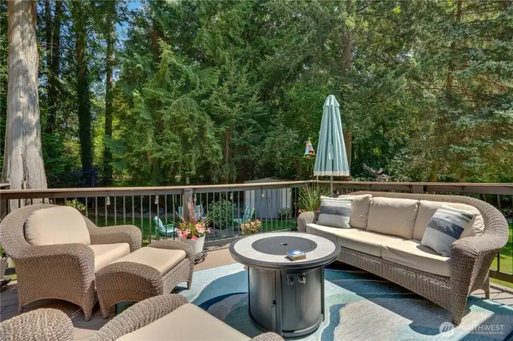 Room for the whole crew: lounge seating, string lights & garden views. Room for the whole crew: lounge seating, string lights & garden views.