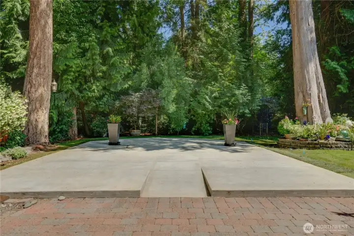 900 sq ft finished concrete pad — sport court or your future vision. 900 sq ft finished concrete pad — sport court or your future vision.