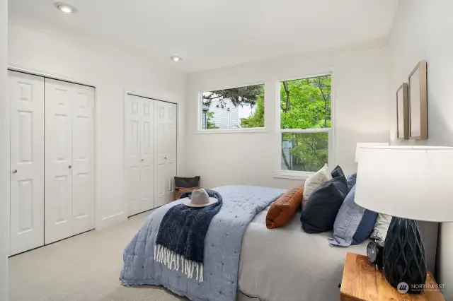 Fourth bedroom on main-level with double closets.