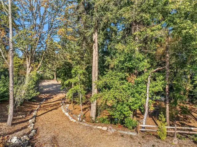 The 2.5 acre Thornton Creek Commons property includes a 1.5 acre arboretum-like permanently preserved open space in the private ownership of the nine Thornton Creek Commons home owners.  Professional landscape maintenance included.