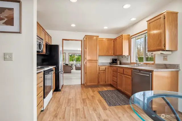 This kitchen is located right off the dining room and there is lots of space when people "gather" here.