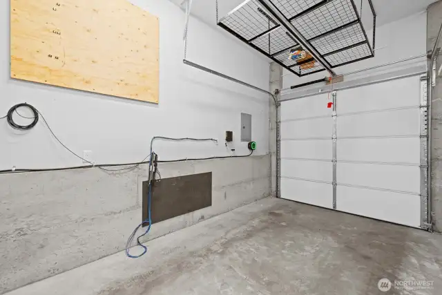 Extra tall attached garage with EV charger