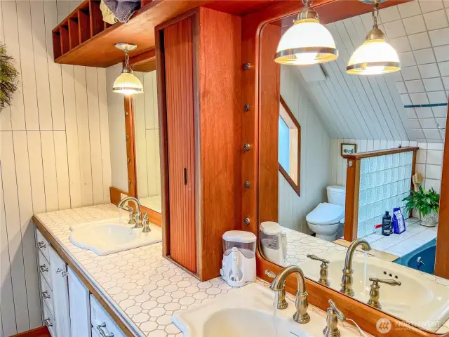 and the oversized jetted tub with a skylight!