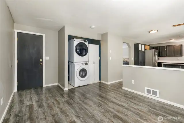 Living area with washer and dryer