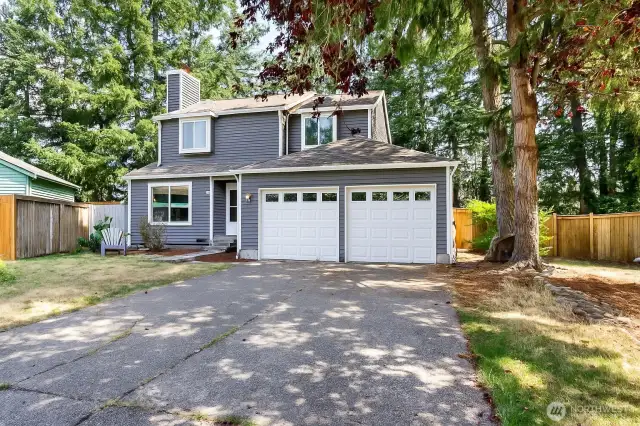 Edited image to show home with matching garage doors. Seller credit available for matching door!