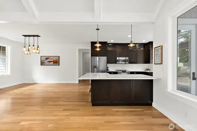 Wrap Around Counter Dining. Upgraded Lighting. Quartz Countertops.