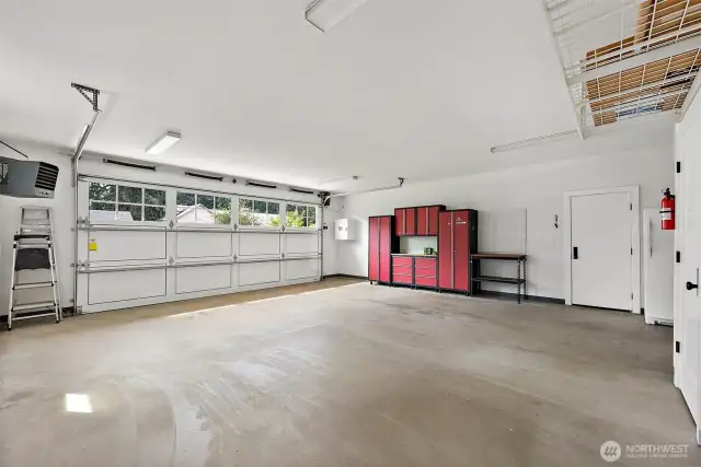 Oversized Garage. Heated. Work Space Stays With Property.