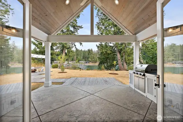Covered Back Patio with a Built-In BBQ. Stamped Concrete and a View.
