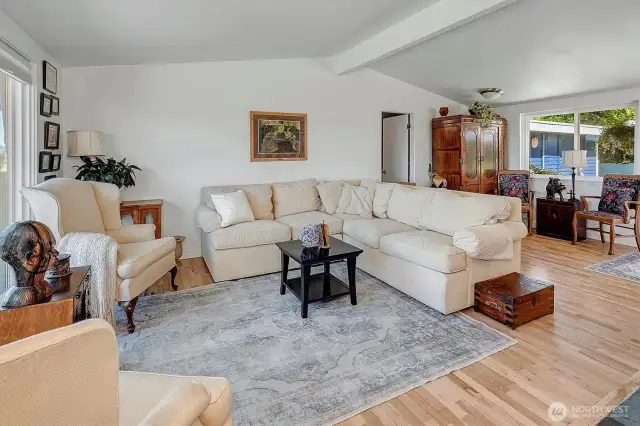 ~step into lovely living room with cathedral ceilings