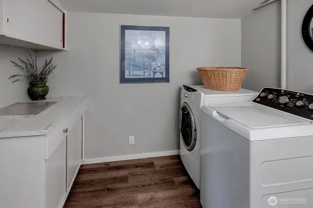 ~large laundry room with tons of storage