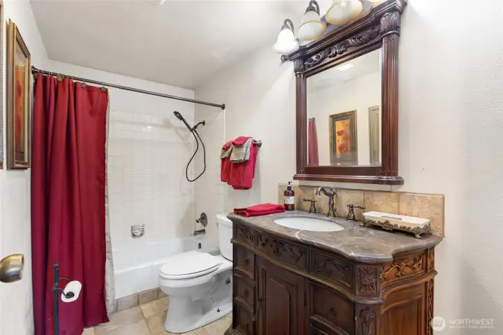 Shared full bath in hallway