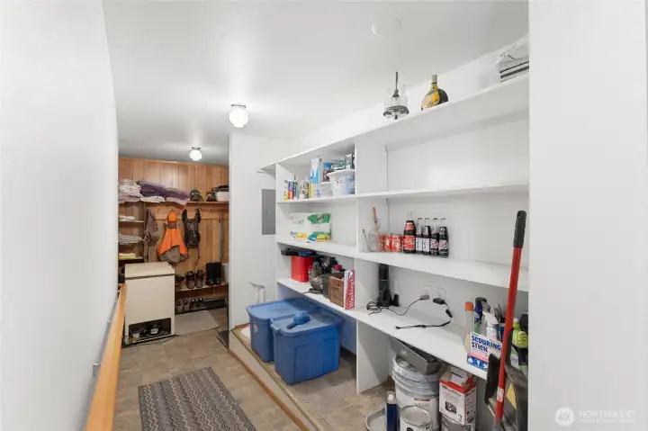 Ramp entry access to garage with huge pantry/storage space!