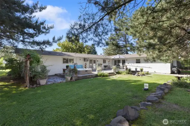 Large Trex Deck along with a Hot tub! Lovely yard space great for entertaining!