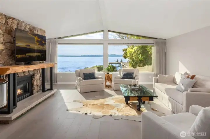 Fabulously refreshed mid-century modern with spectacular Lake Washington, Olympic Mountain and Seattle skyline views!