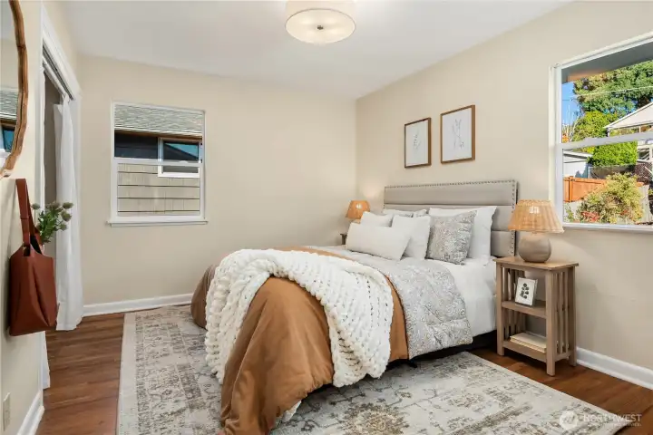 The second main floor bedroom is also generous in size with a large closet.