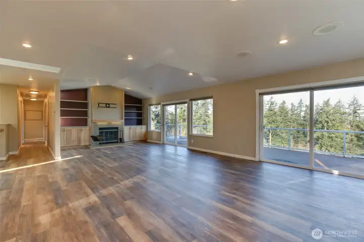 Check out the pull down stairs for the carpeted and lighted attic in the hallway.