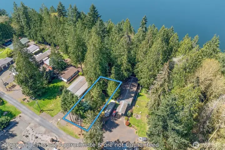Property Lines approximate. Tacoma Power and Light manages the shore line between property and the lake