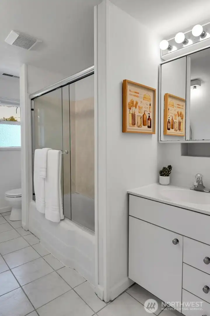 The second full Bath is conveniently located between the second and third bedrooms.