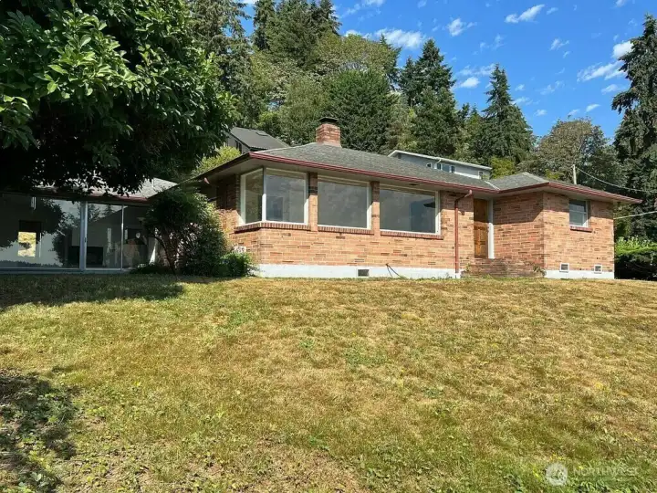 The home sits up high on a hill which allows for panoramic views of the lake and mountains.