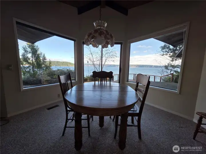Dining room looking toward patio, deck and view of Hood Canal
