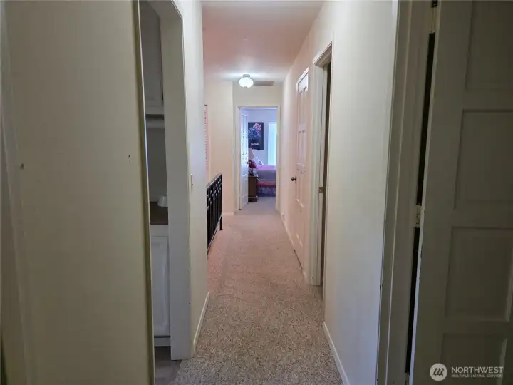 hallway looking toward primary bedroom
