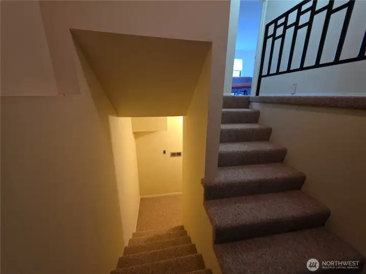 interior stairs down to the 2 bay garage