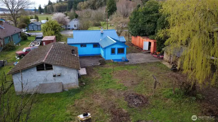 Backyard with out buildings.