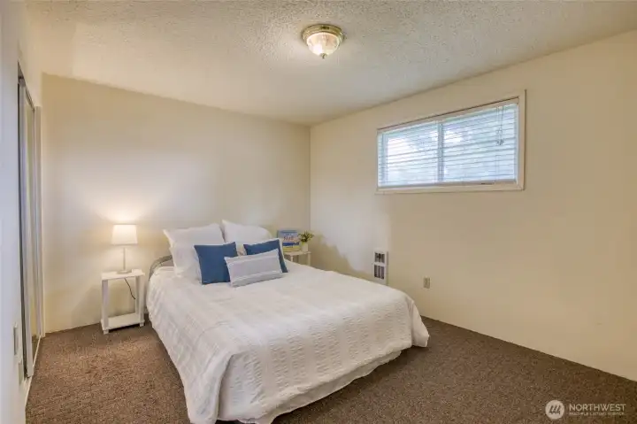 Inviting primary bedroom with a quiet, relaxed feel