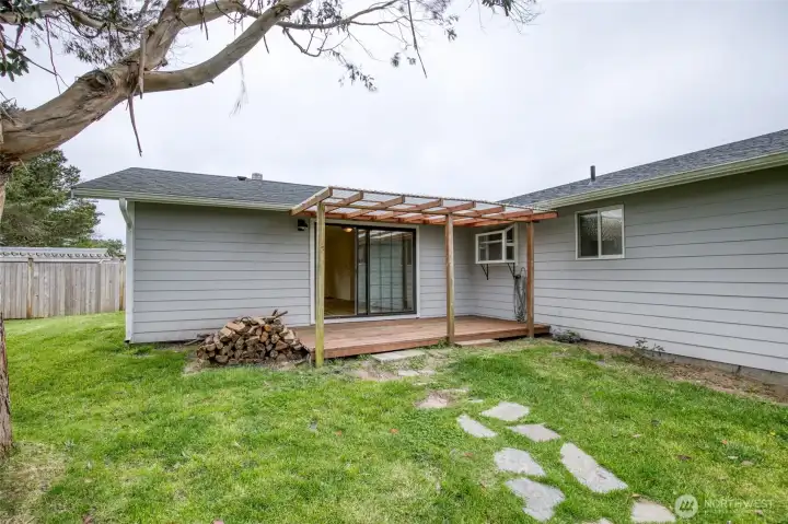 Spacious backyard offers flexibility for gardening, recreation, or simply unwinding outdoors