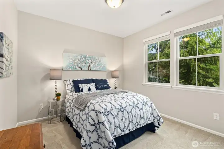 Main Floor bedroom great for guests or use as home office