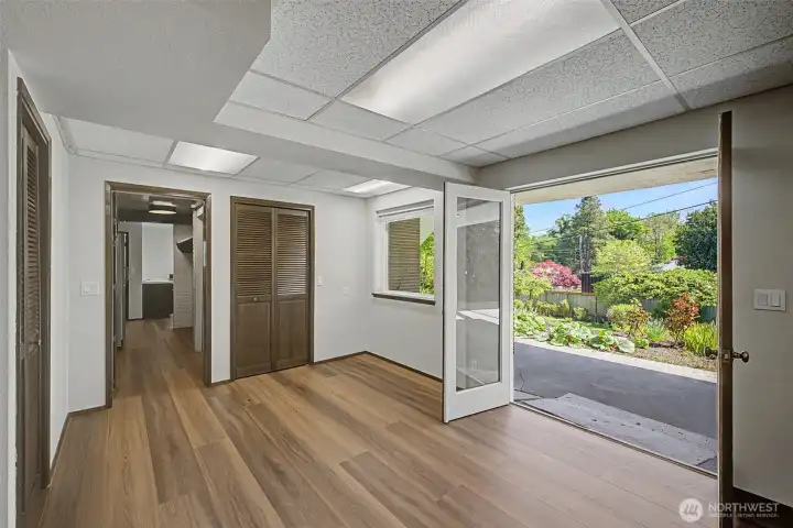 Great Room - French doors lead to large outdoor space, great for entertaining.