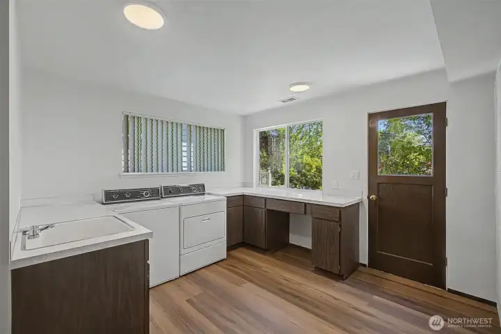 Large laundry room with sink