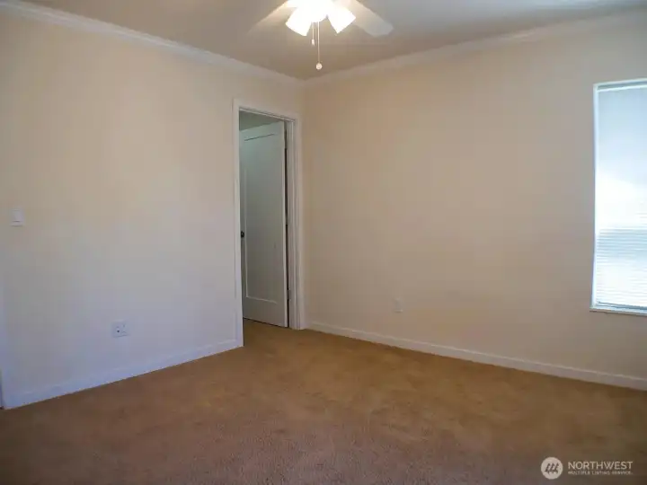 Primary BR with continental bath and 2 windows. the walk-in closet access is shown here. NOTE: This unit features 2 ceiling fan lights. Primary BR with continental bath and 2 windows. the walk-in closet access is shown here. NOTE: This unit features 2 ceiling fan lights.