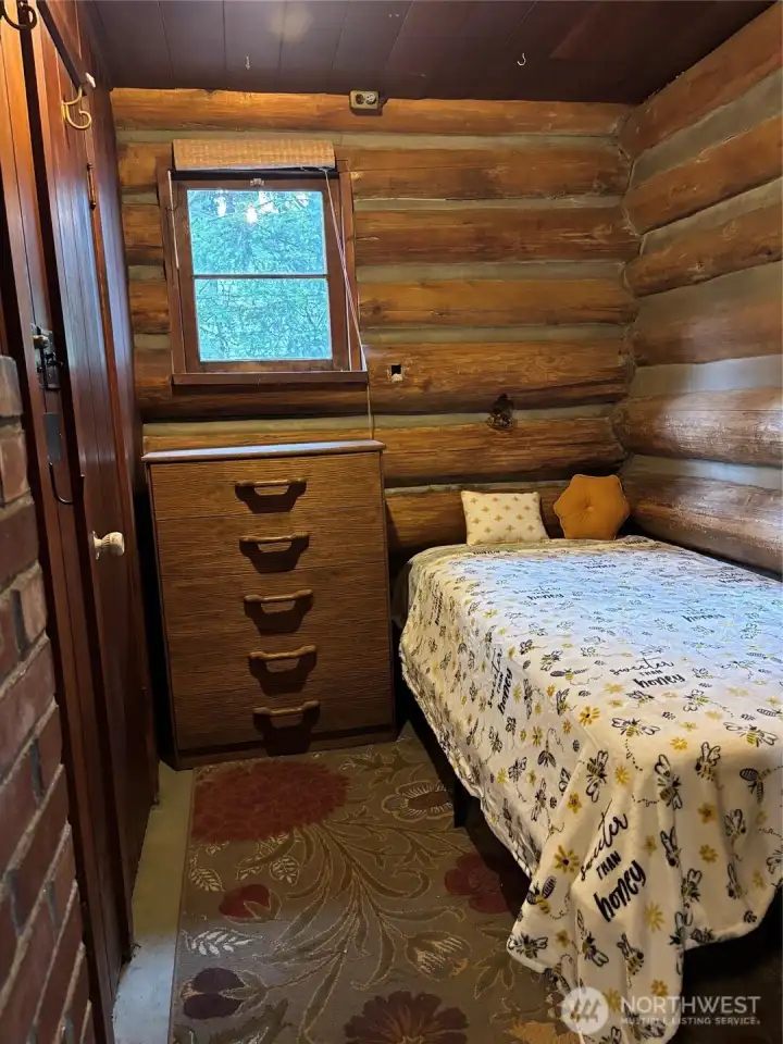 Bedroom with dresser, storage closet and long twin fits for tall people. Bedroom with dresser, storage closet and long twin fits for tall people.