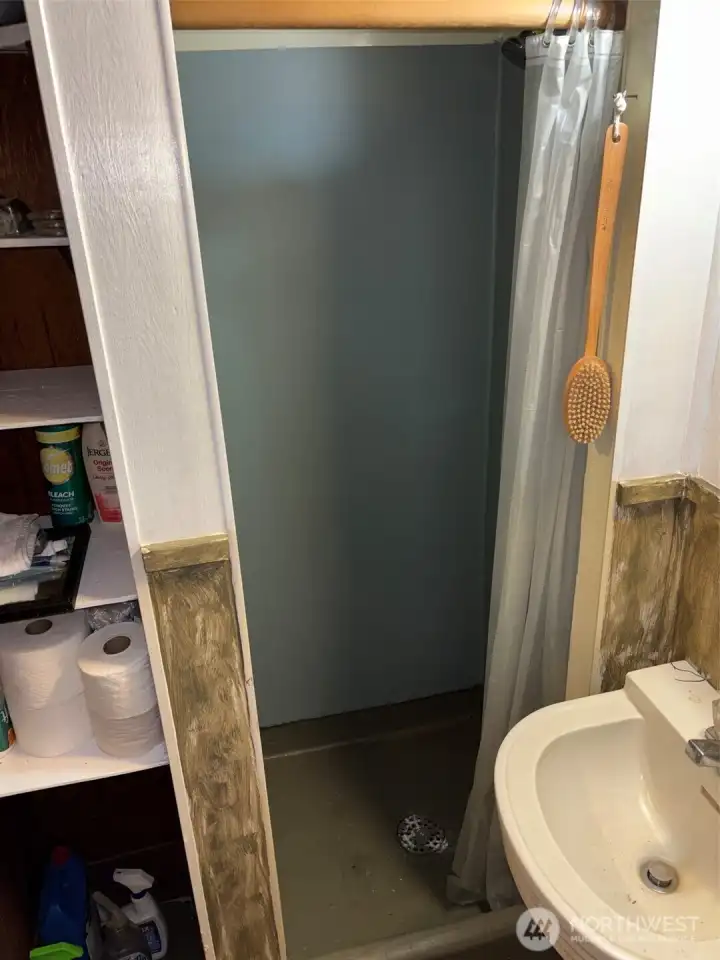 Shower with linen closet Shower with linen closet