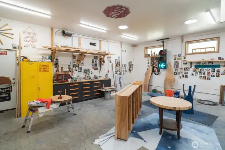 large attached work area behind the garage area large attached work area behind the garage area