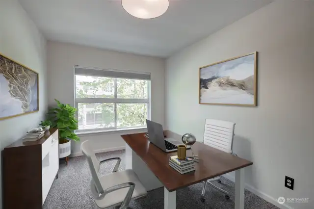 Virtually staged 2nd bedroom showing possible home office layout