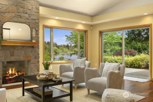Elegant stone surround fireplace blends in well with the natural view.
