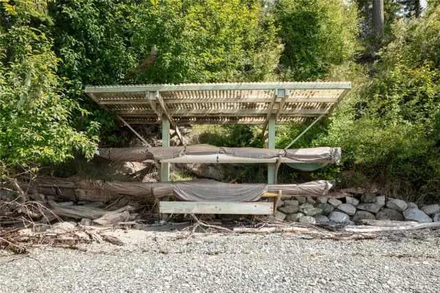 Stone steps take you to the kayak storage on the beach.