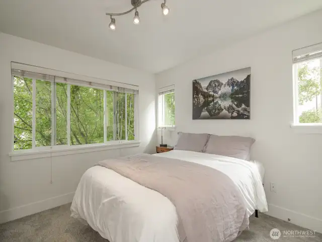 Primary bedroom with plenty of light and double closets.