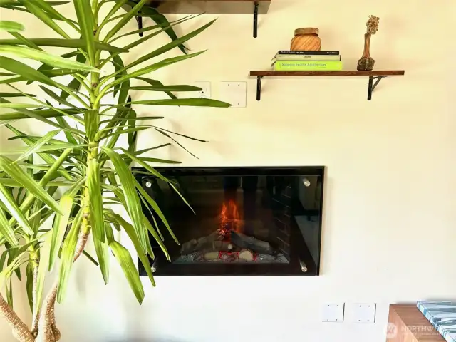 Cozy electric fireplace that kicks out heat.